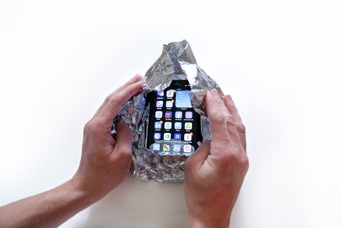 Wrapping smartphone in tin foil