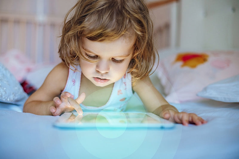 Little Girl Using Tablet