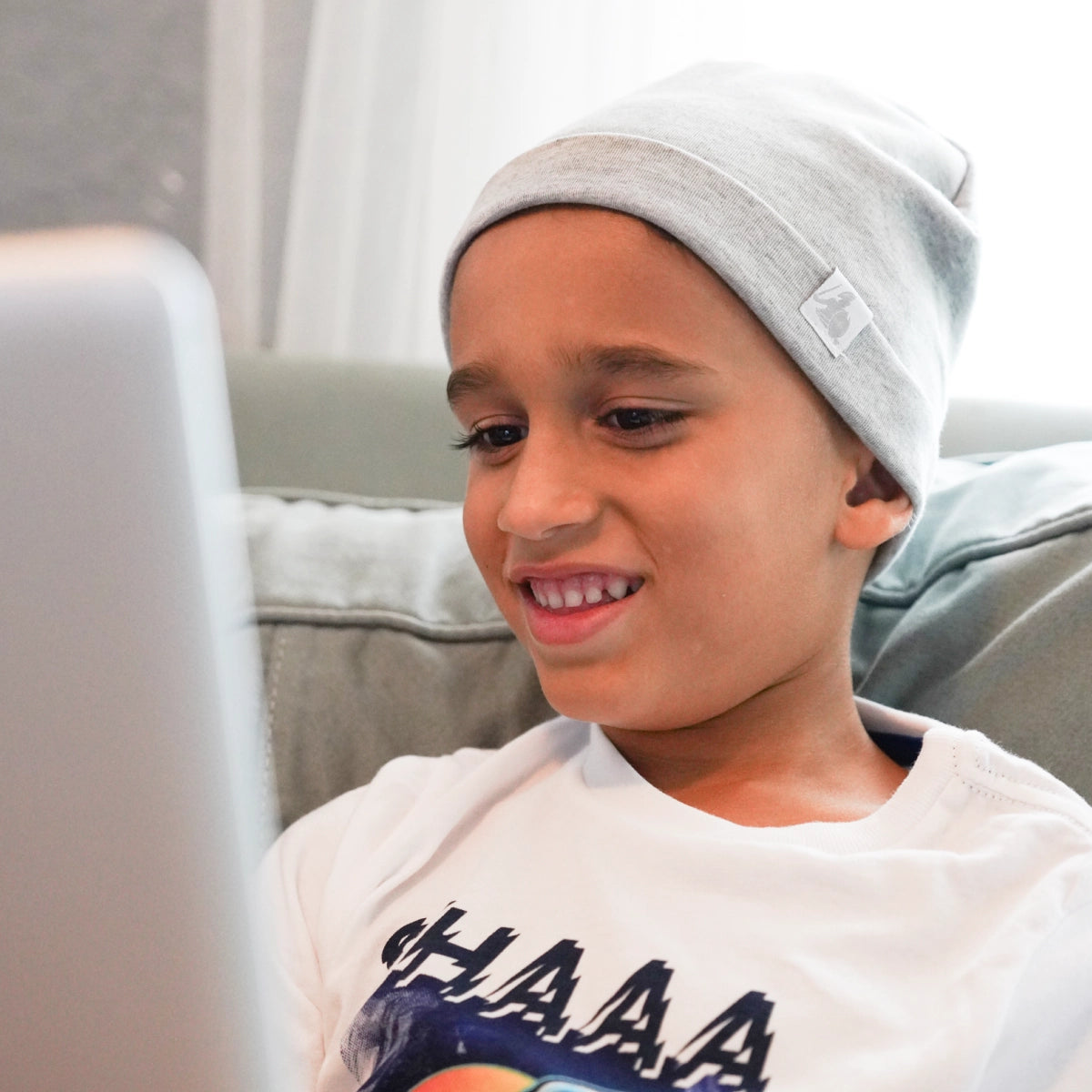 DefenderShield EMF Protection Child Beanie Gray boy wearing beanie