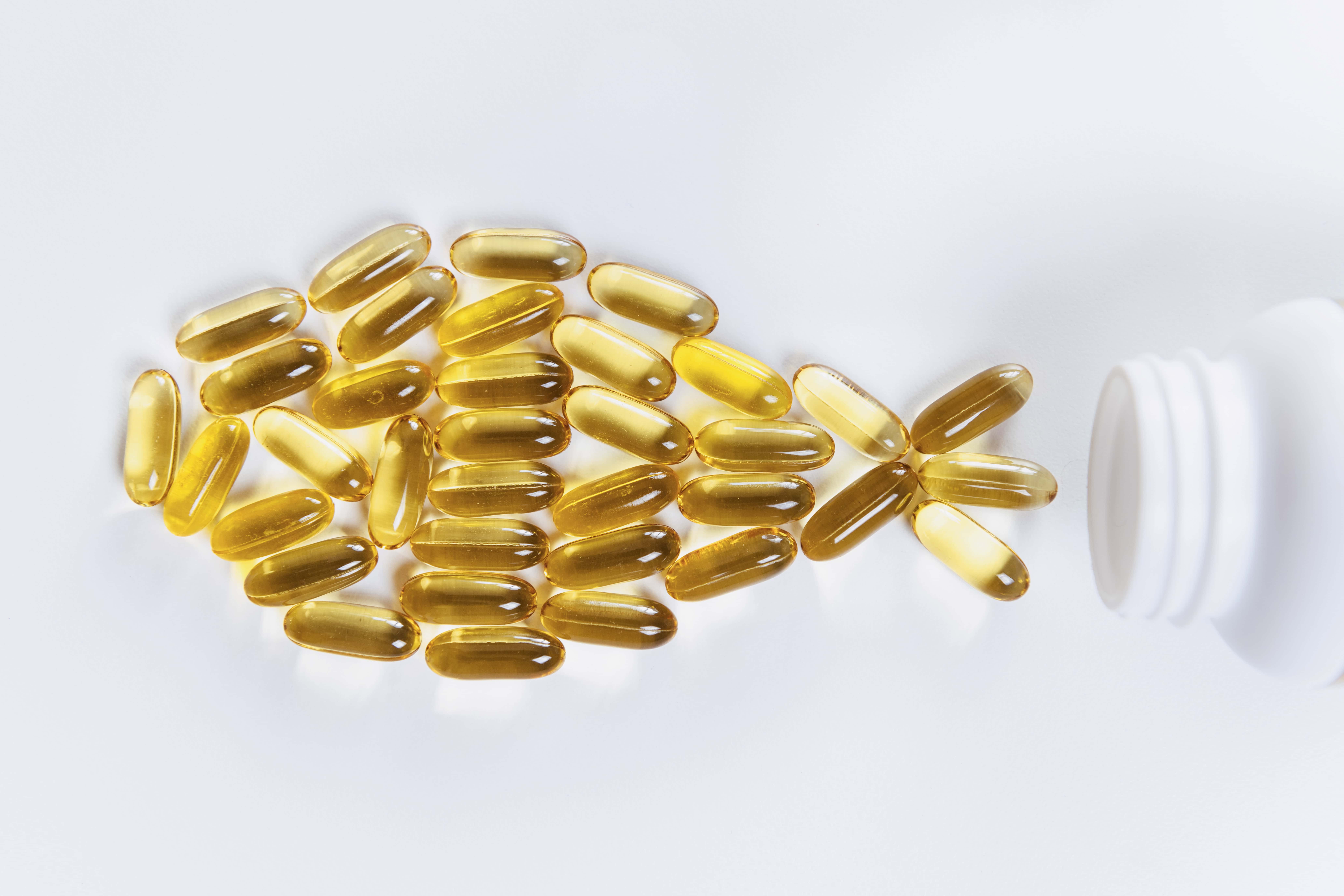 Lightbody Omega-3 supplement pills in shape of fish